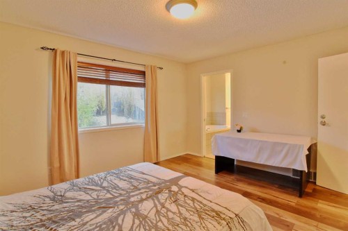 133 Panamount Court Nw, Calgary, AB - Indoor Photo Showing Bedroom