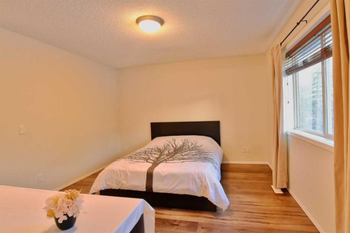 133 Panamount Court Nw, Calgary, AB - Indoor Photo Showing Bedroom