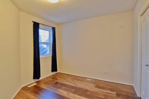133 Panamount Court Nw, Calgary, AB - Indoor Photo Showing Other Room