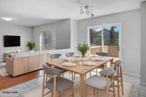 26 Rocky Ridge Heights Nw, Calgary, AB - Indoor Photo Showing Dining Room