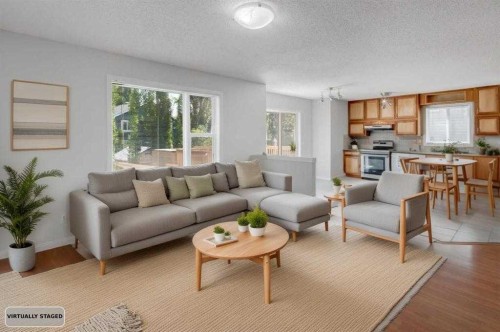 26 Rocky Ridge Heights Nw, Calgary, AB - Indoor Photo Showing Living Room