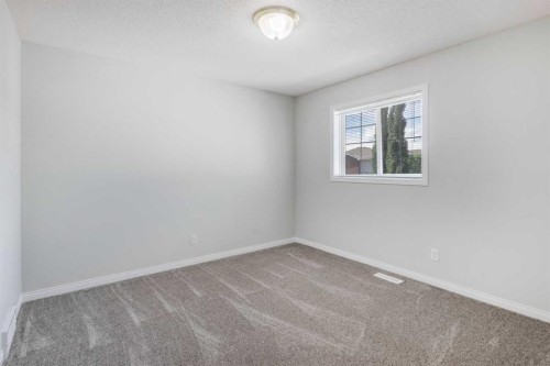 26 Rocky Ridge Heights Nw, Calgary, AB - Indoor Photo Showing Other Room