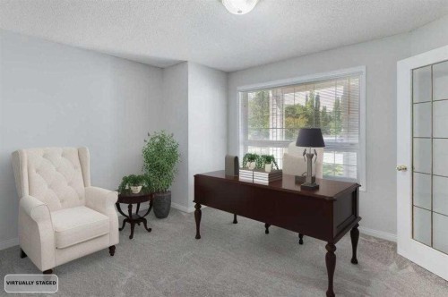 26 Rocky Ridge Heights Nw, Calgary, AB - Indoor Photo Showing Other Room