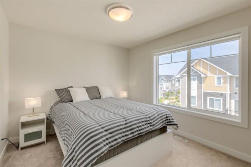 536 Canals Crossing Sw, Airdrie, AB - Indoor Photo Showing Bedroom