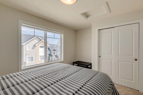 536 Canals Crossing Sw, Airdrie, AB - Indoor Photo Showing Bedroom
