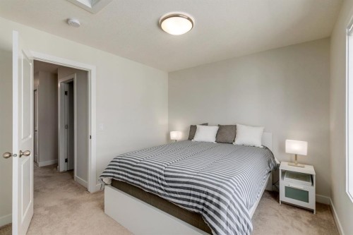 536 Canals Crossing Sw, Airdrie, AB - Indoor Photo Showing Bedroom