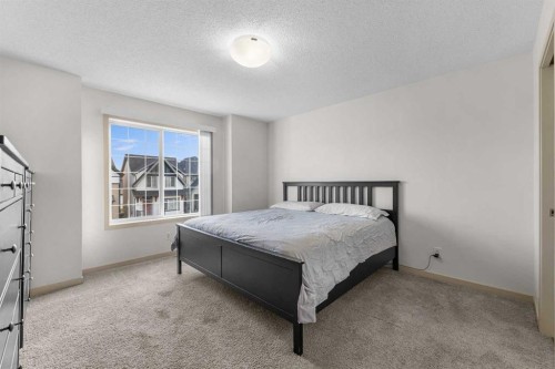 107 Masters Heights Se, Calgary, AB - Indoor Photo Showing Bedroom