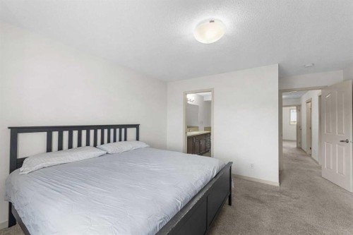 107 Masters Heights Se, Calgary, AB - Indoor Photo Showing Bedroom