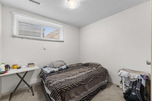 107 Masters Heights Se, Calgary, AB - Indoor Photo Showing Bedroom