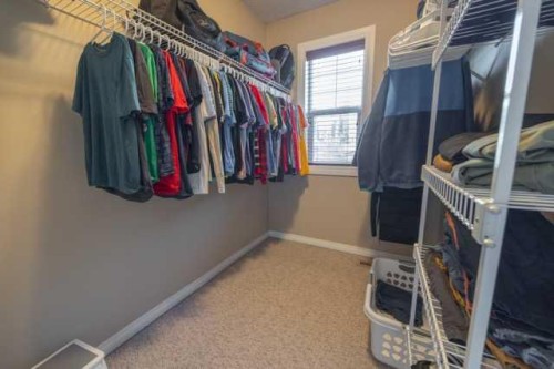 28 Crestmont Way Sw, Calgary, AB - Indoor With Storage