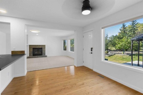 432 Royal Oak Circle Nw, Calgary, AB - Indoor Photo Showing Other Room With Fireplace
