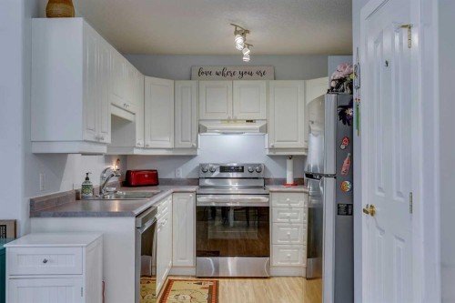 1115-1818 Simcoe Boulevard Sw, Calgary, AB - Indoor Photo Showing Kitchen