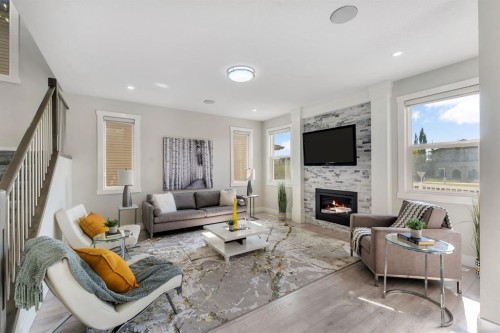 229 Walgrove Terrace Se, Calgary, AB - Indoor Photo Showing Living Room With Fireplace