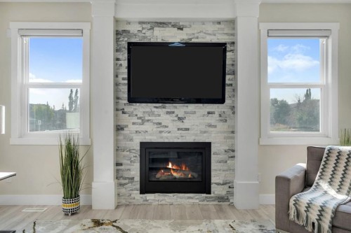 229 Walgrove Terrace Se, Calgary, AB - Indoor Photo Showing Living Room With Fireplace