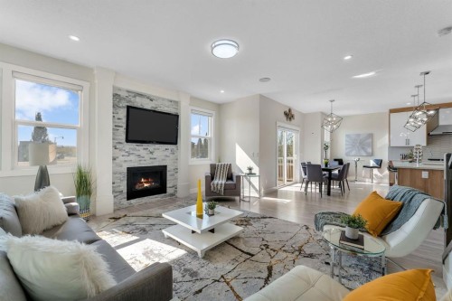 229 Walgrove Terrace Se, Calgary, AB - Indoor Photo Showing Living Room With Fireplace