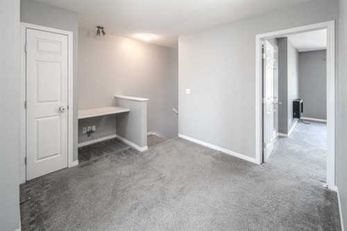 17 Hidden Creek Rise Nw, Calgary, AB - Indoor Photo Showing Other Room