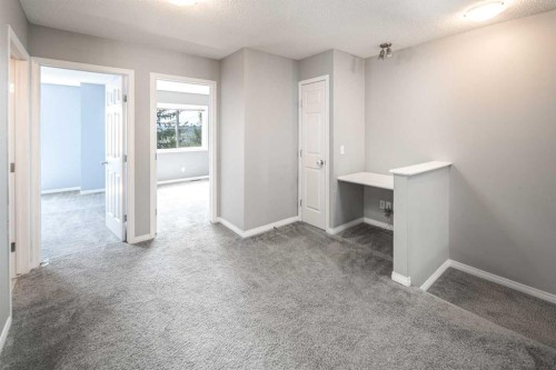 17 Hidden Creek Rise Nw, Calgary, AB - Indoor Photo Showing Other Room