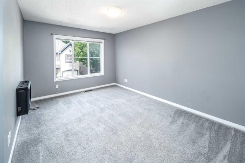 17 Hidden Creek Rise Nw, Calgary, AB - Indoor Photo Showing Other Room