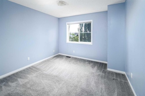 17 Hidden Creek Rise Nw, Calgary, AB - Indoor Photo Showing Other Room