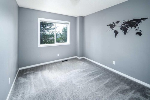 17 Hidden Creek Rise Nw, Calgary, AB - Indoor Photo Showing Other Room