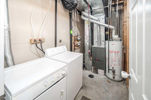 17 Hidden Creek Rise Nw, Calgary, AB - Indoor Photo Showing Laundry Room
