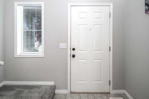17 Hidden Creek Rise Nw, Calgary, AB - Indoor Photo Showing Other Room