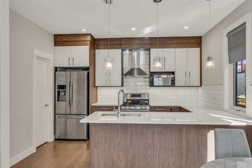 1-1936 26 Street Sw, Calgary, AB - Indoor Photo Showing Kitchen With Stainless Steel Kitchen With Upgraded Kitchen