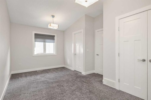 1-1936 26 Street Sw, Calgary, AB - Indoor Photo Showing Other Room