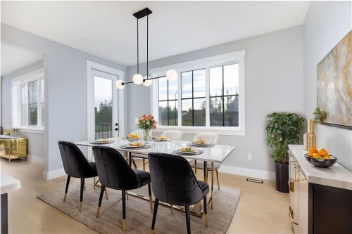 1209 Coopers Drive Sw, Airdrie, AB - Indoor Photo Showing Dining Room