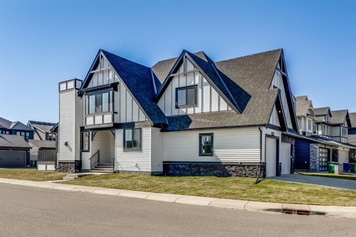 1209 Coopers Drive Sw, Airdrie, AB - Outdoor With Facade