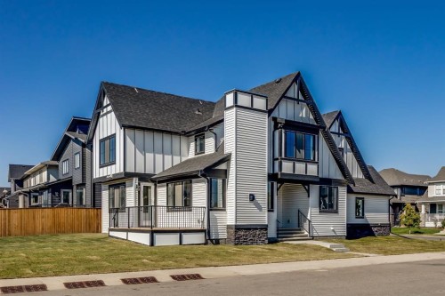 1209 Coopers Drive Sw, Airdrie, AB - Outdoor With Facade