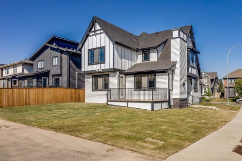 1209 Coopers Drive Sw, Airdrie, AB - Outdoor With Facade