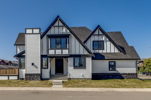 1209 Coopers Drive Sw, Airdrie, AB - Outdoor With Facade