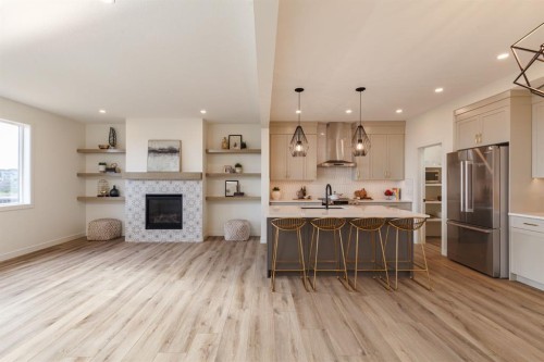 112 Sunrise Heath, Cochrane, AB - Indoor With Fireplace