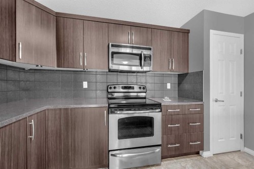 304 Windstone Gardens Sw, Airdrie, AB - Indoor Photo Showing Kitchen