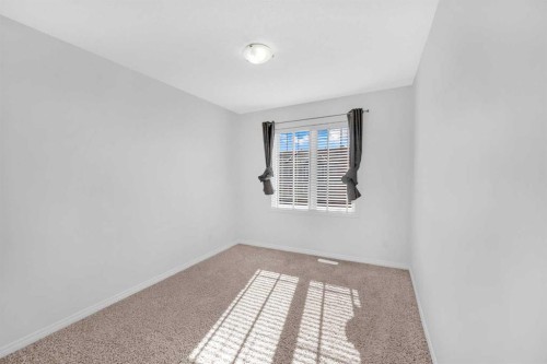 304 Windstone Gardens Sw, Airdrie, AB - Indoor Photo Showing Other Room