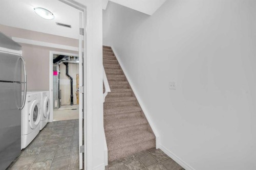 304 Windstone Gardens Sw, Airdrie, AB - Indoor Photo Showing Laundry Room