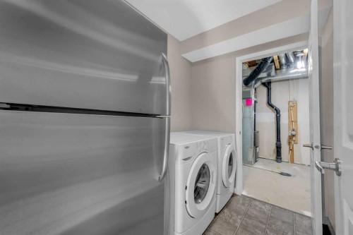304 Windstone Gardens Sw, Airdrie, AB - Indoor Photo Showing Laundry Room
