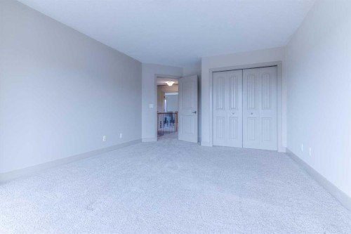 52 Elmont Green Sw, Calgary, AB - Indoor Photo Showing Other Room