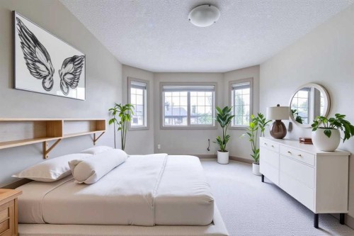 52 Elmont Green Sw, Calgary, AB - Indoor Photo Showing Bedroom