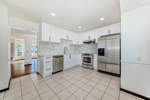 79 Bermuda Drive Nw, Calgary, AB - Indoor Photo Showing Kitchen With Upgraded Kitchen