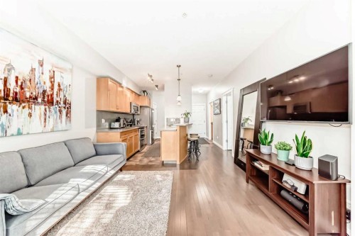 214-2 Hemlock Crescent Sw, Calgary, AB - Indoor Photo Showing Living Room