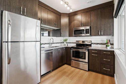 182 Panamount Road Nw, Calgary, AB - Indoor Photo Showing Kitchen With Upgraded Kitchen