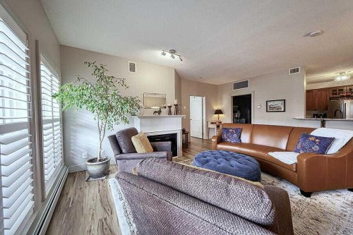 1233-151 Country Village Road Ne, Calgary, AB - Indoor Photo Showing Living Room