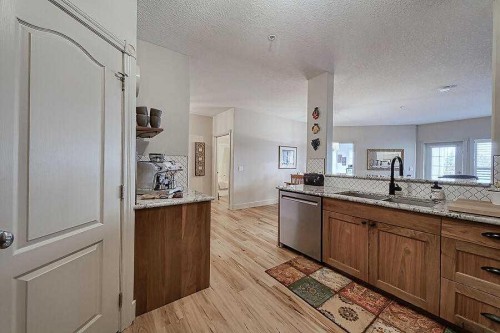 1233-151 Country Village Road Ne, Calgary, AB - Indoor Photo Showing Kitchen
