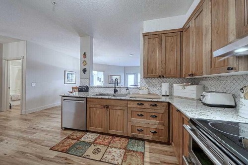 1233-151 Country Village Road Ne, Calgary, AB - Indoor Photo Showing Kitchen