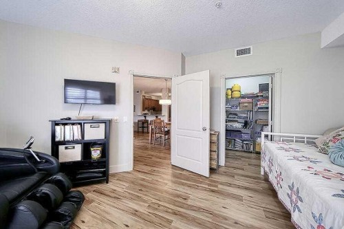 1233-151 Country Village Road Ne, Calgary, AB - Indoor Photo Showing Bedroom