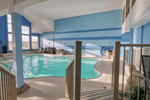 1233-151 Country Village Road Ne, Calgary, AB - Indoor Photo Showing Other Room With In Ground Pool