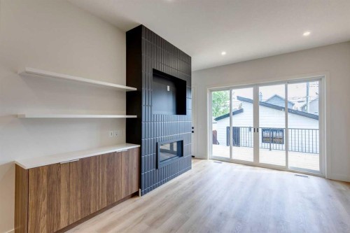 2309 21 Avenue Sw, Calgary, AB - Indoor Photo Showing Other Room With Fireplace