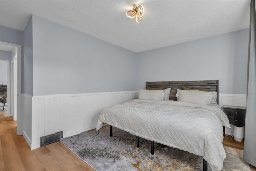 1318 Whitfield Avenue, Crossfield, AB - Indoor Photo Showing Bedroom
